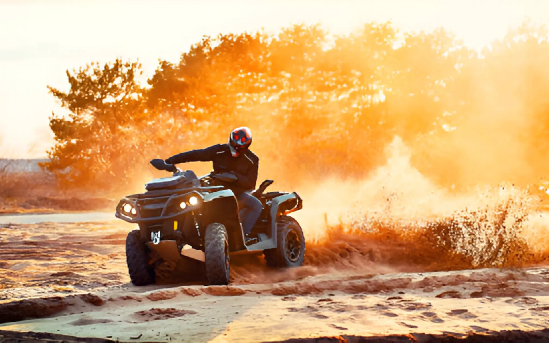 Rider on ATV kicking up golden dust, dynamic motion, warm backlit sunset atmosphere